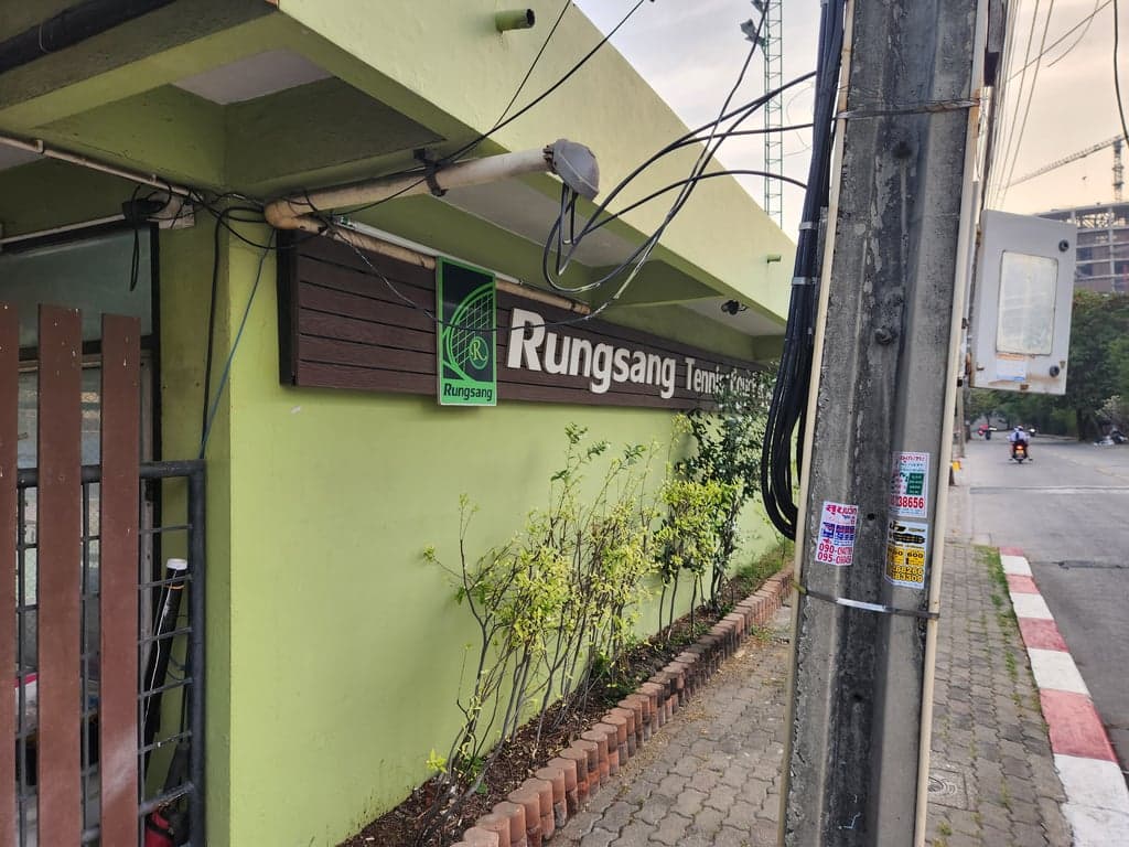 Rungsang Tennis Courts entrance and sign on Bang Na-Trat 1 Alley